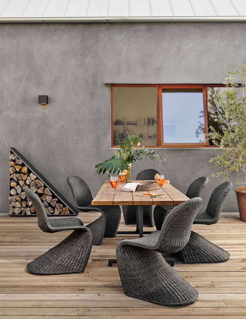 four-hands-grass-roots-collection-vintage-coal-portia-outdoor-dining-chair-JLAN-234A-lifestyle.jpg